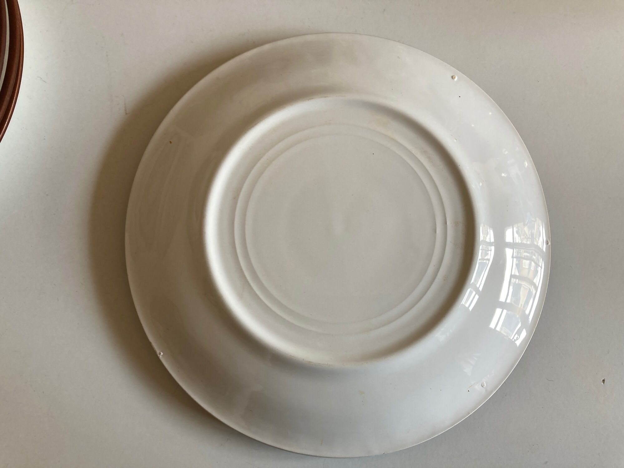 Set of 6 flat plates and 6 hollows in enamelled earth KMK 1965