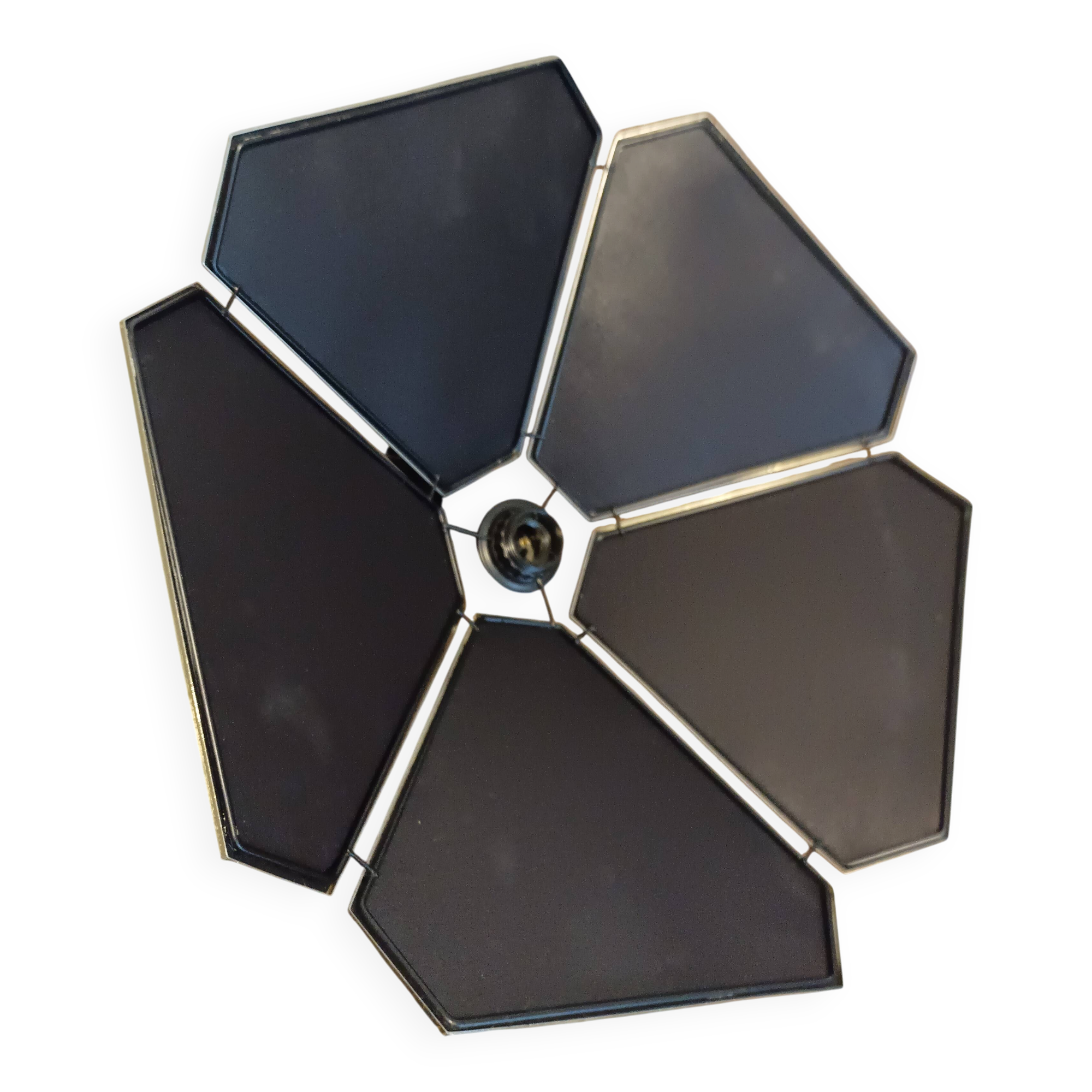 Black and gold petal suspension by Robert de Schuytener.