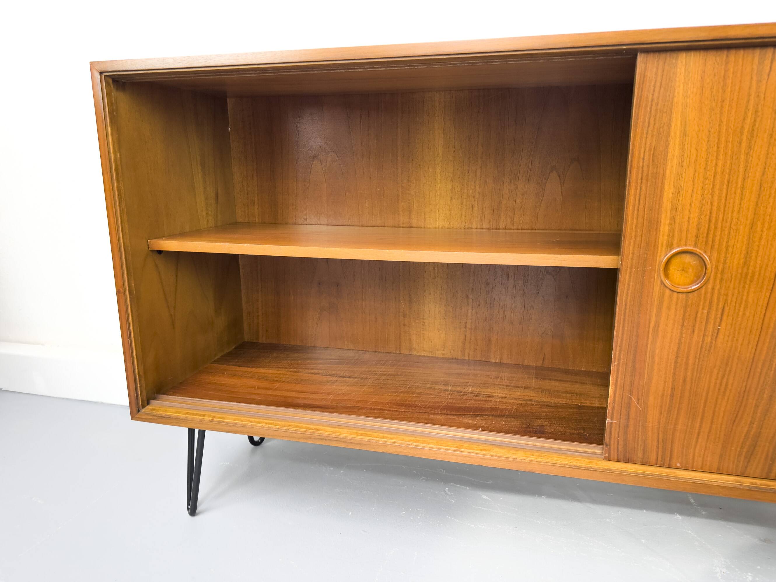 Walnut sideboard with sliding doors by Franzmeyer, 1959