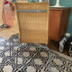 Trio of vintage Ikea rattan and aluminum chairs