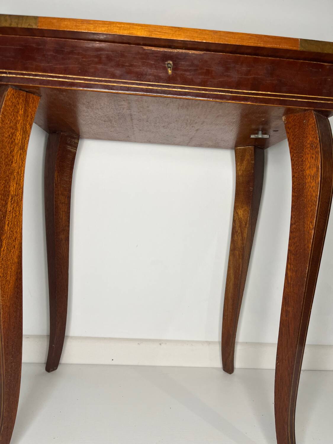 Small antique Italian inlaid table with Swiss music box.