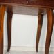 Small antique Italian inlaid table with Swiss music box.