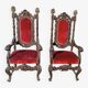 Paire de fauteuils anciens, sculptés en noyer.