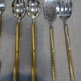 Ménagère en métal argenté et doré 104 couverts