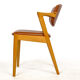 Four Kai Kristiansen oak chairs with new leather upholstery