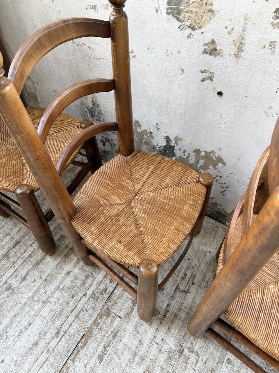 Set of 4 oak and straw chairs Dudouyt 1940