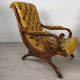 Pair of padded Chesterfield armchairs