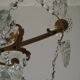 Chandelier 12 lamps with grapevines in crystal, bronze and regulated