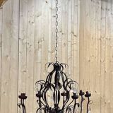 Large pineapple chandelier in blackened metal and tassels