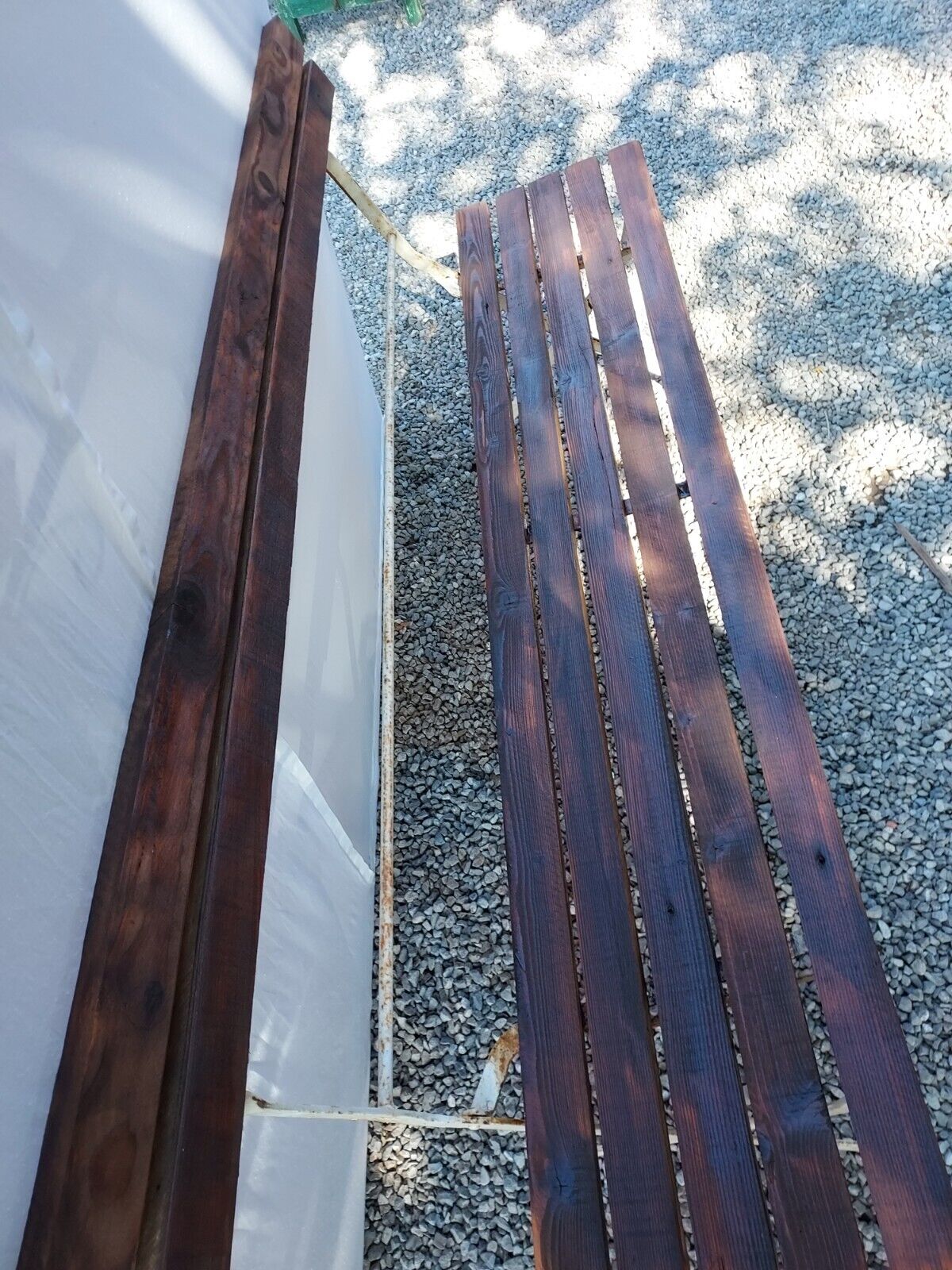 Folding garden bench in wrought iron and wood