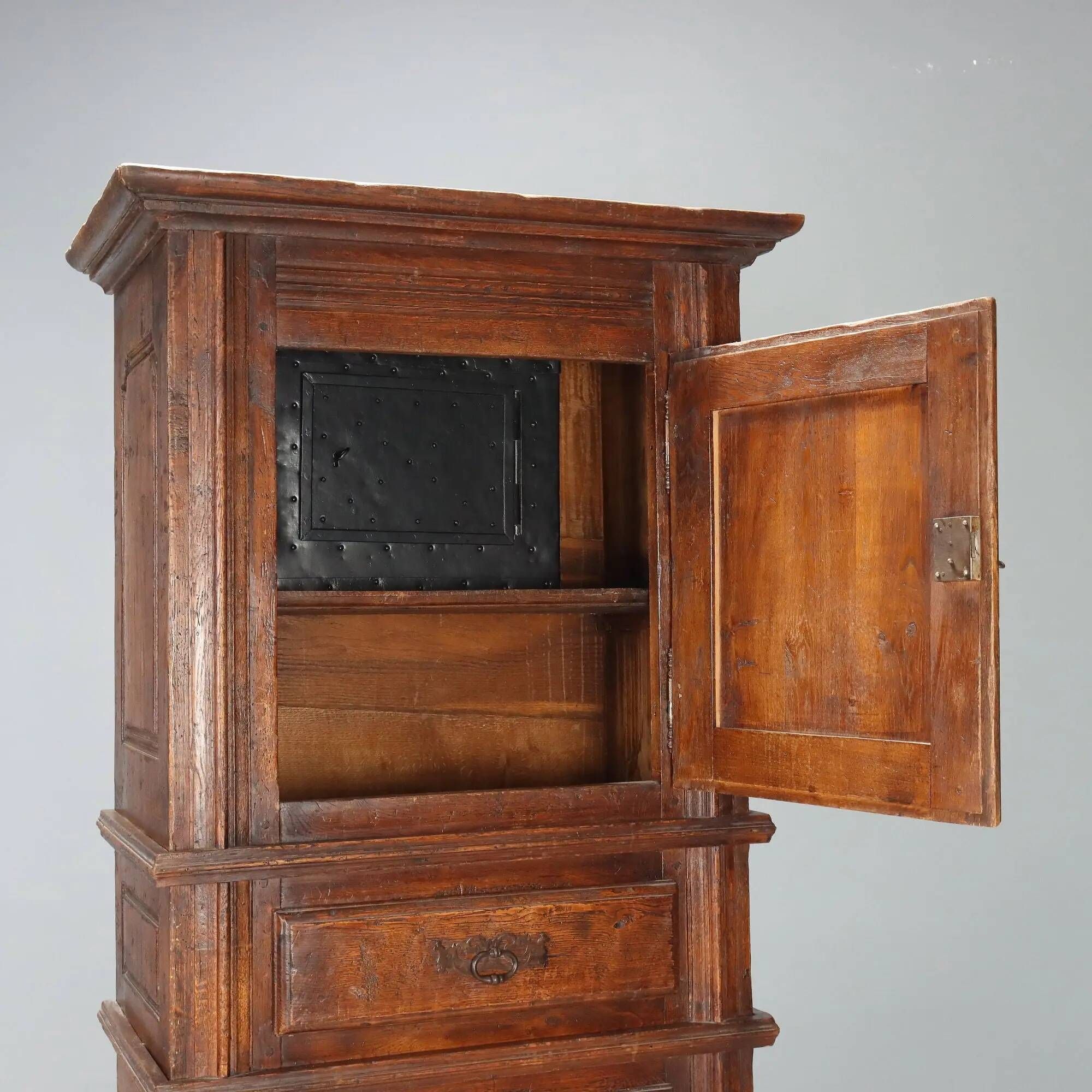 Antique baroque wardrobe in oak with safe, Italy, late 19th century.