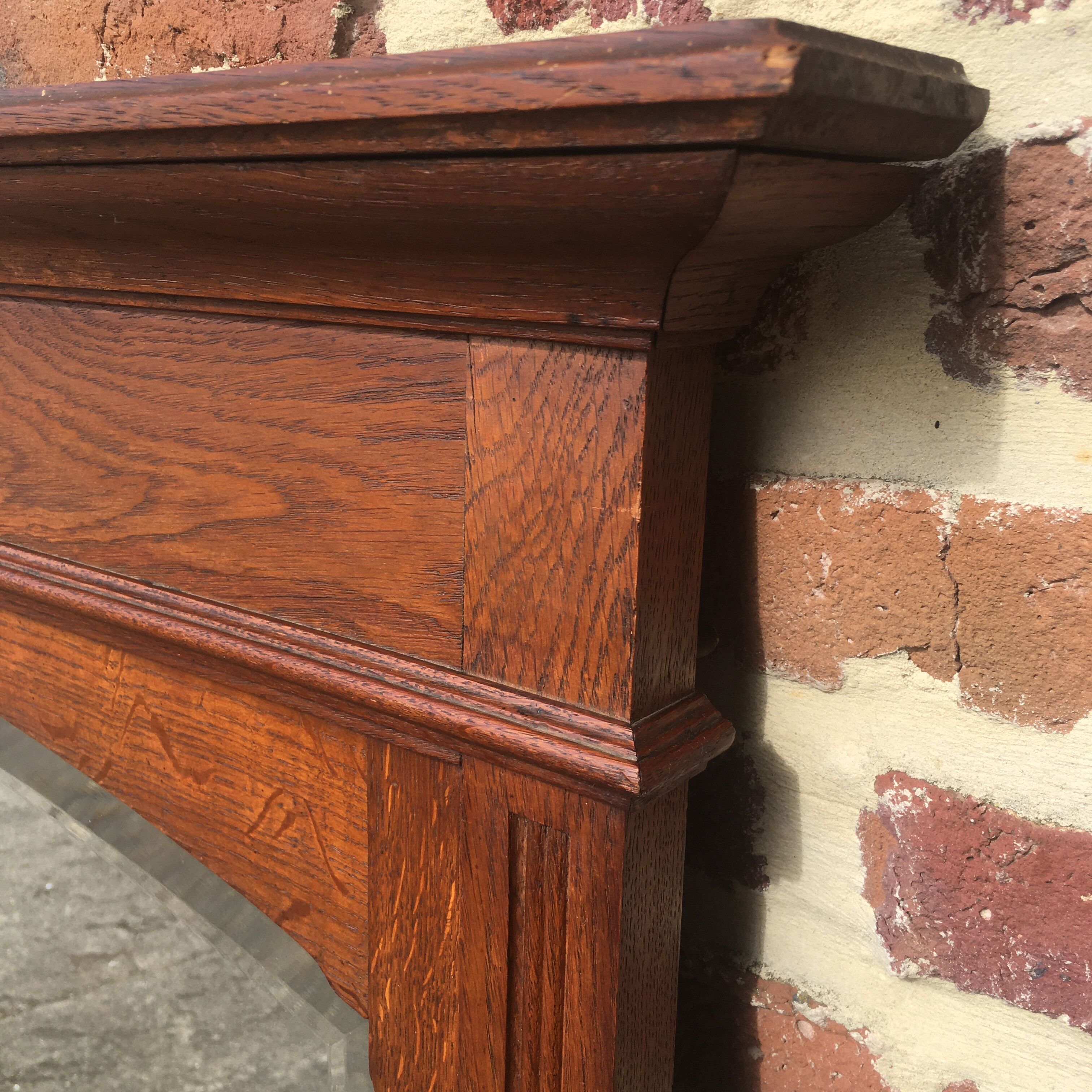 Beveled fireplace mirror