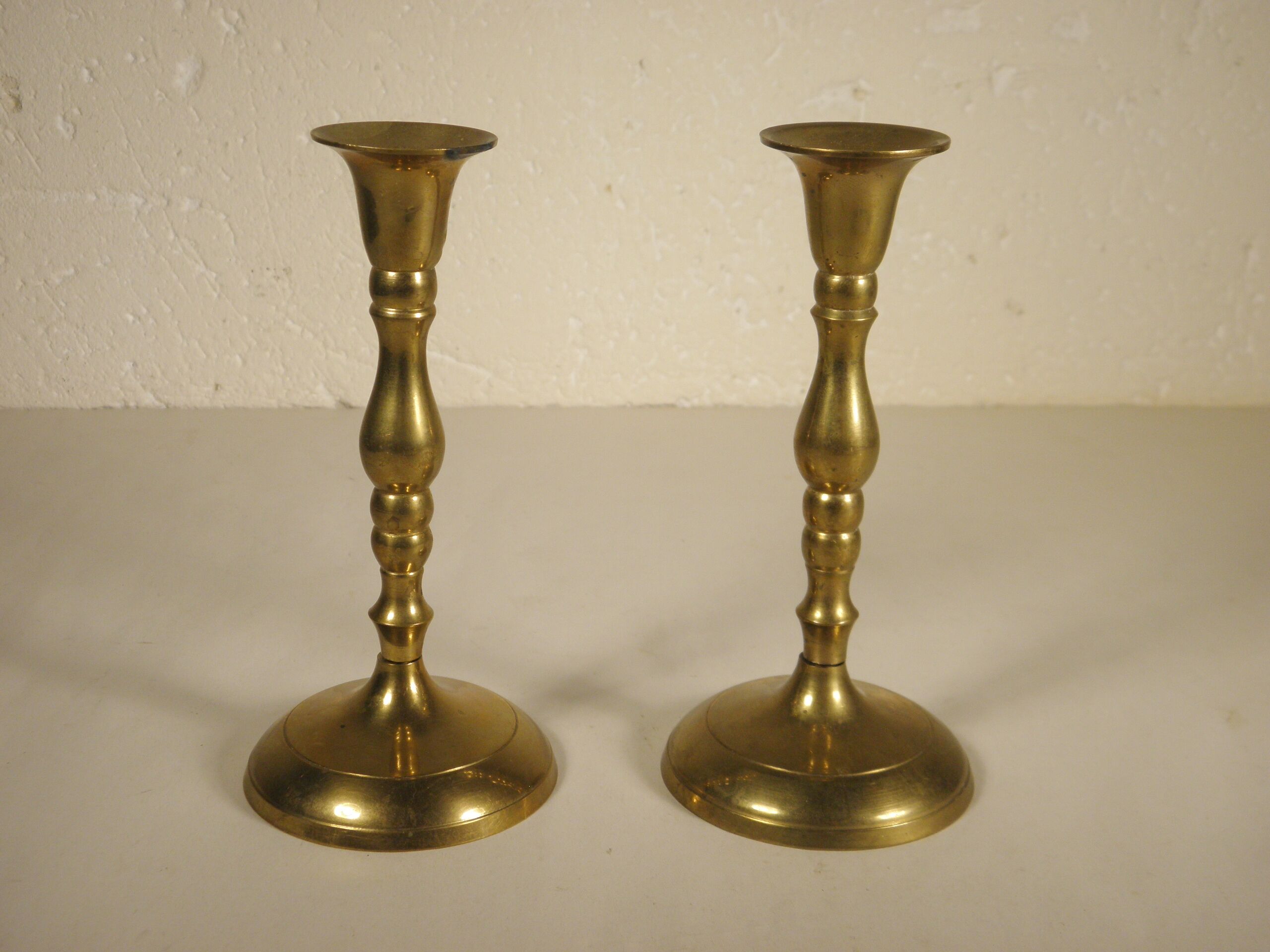 Pair of brass candle holders
