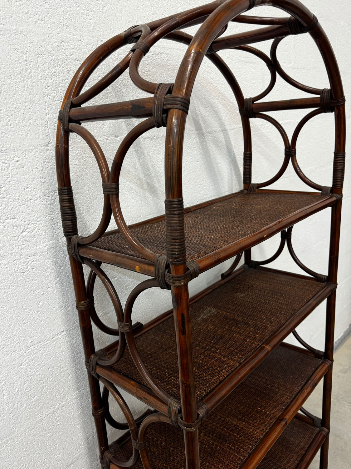 Dark rattan and bamboo bookshelf shelf