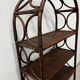 Dark rattan and bamboo bookshelf shelf