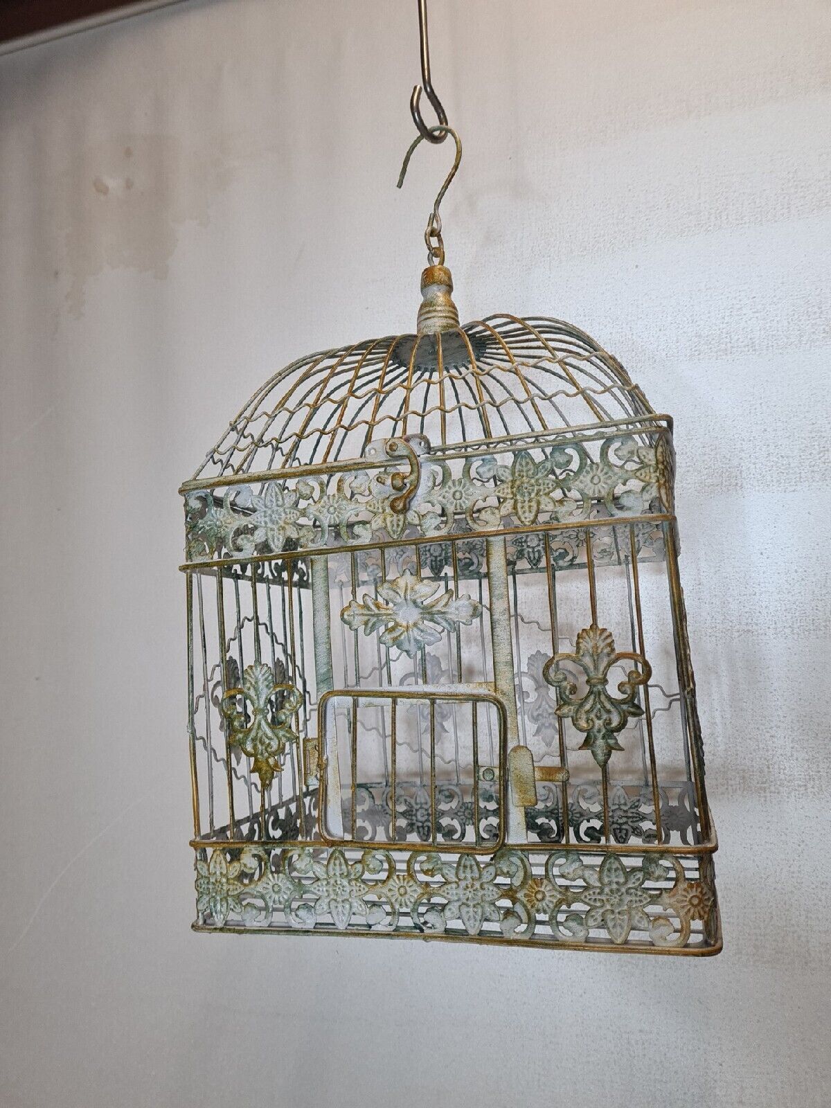 Weathered iron birdcage