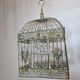 Weathered iron birdcage