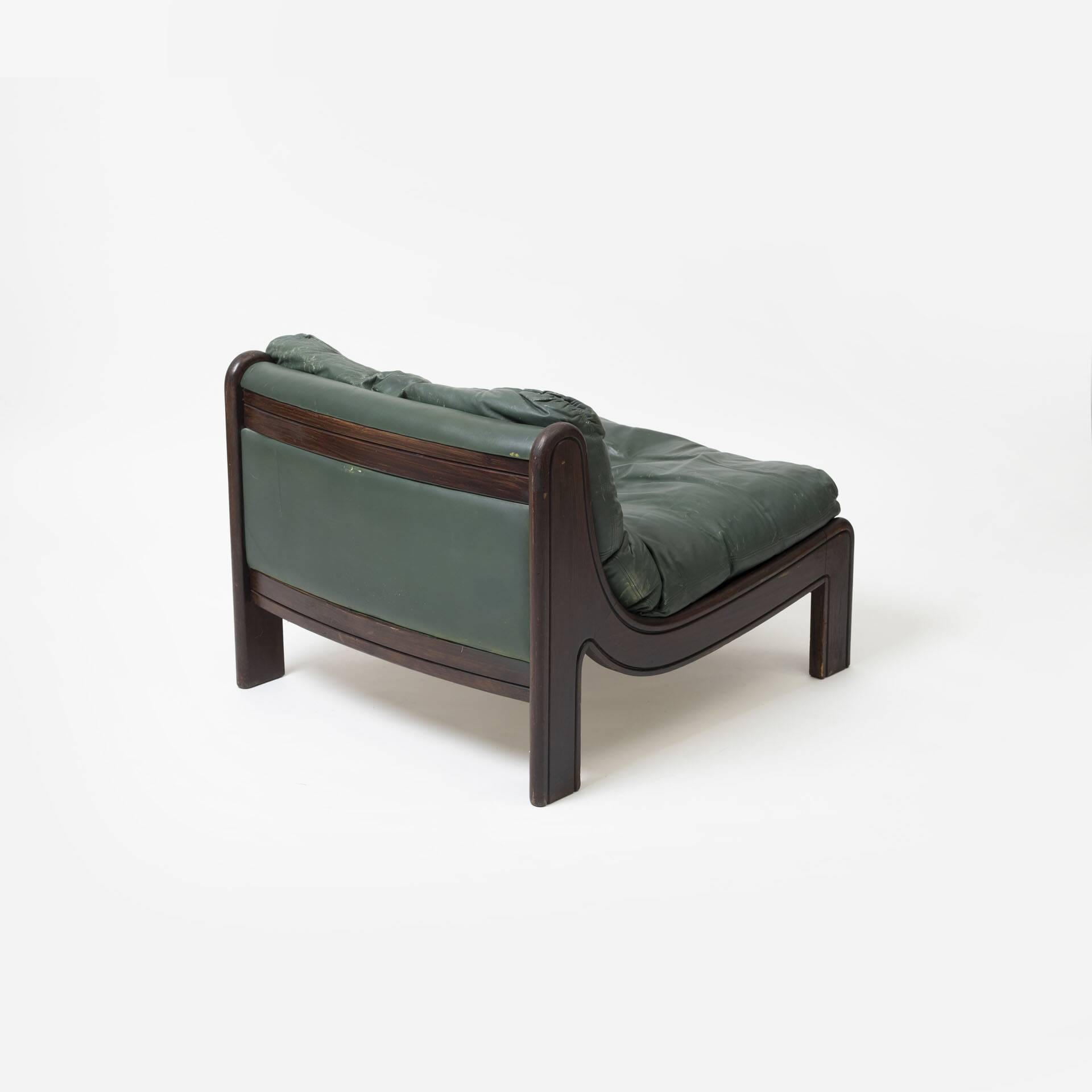 Pair of low sling chairs in hardwood and leather, Germany, 1970s