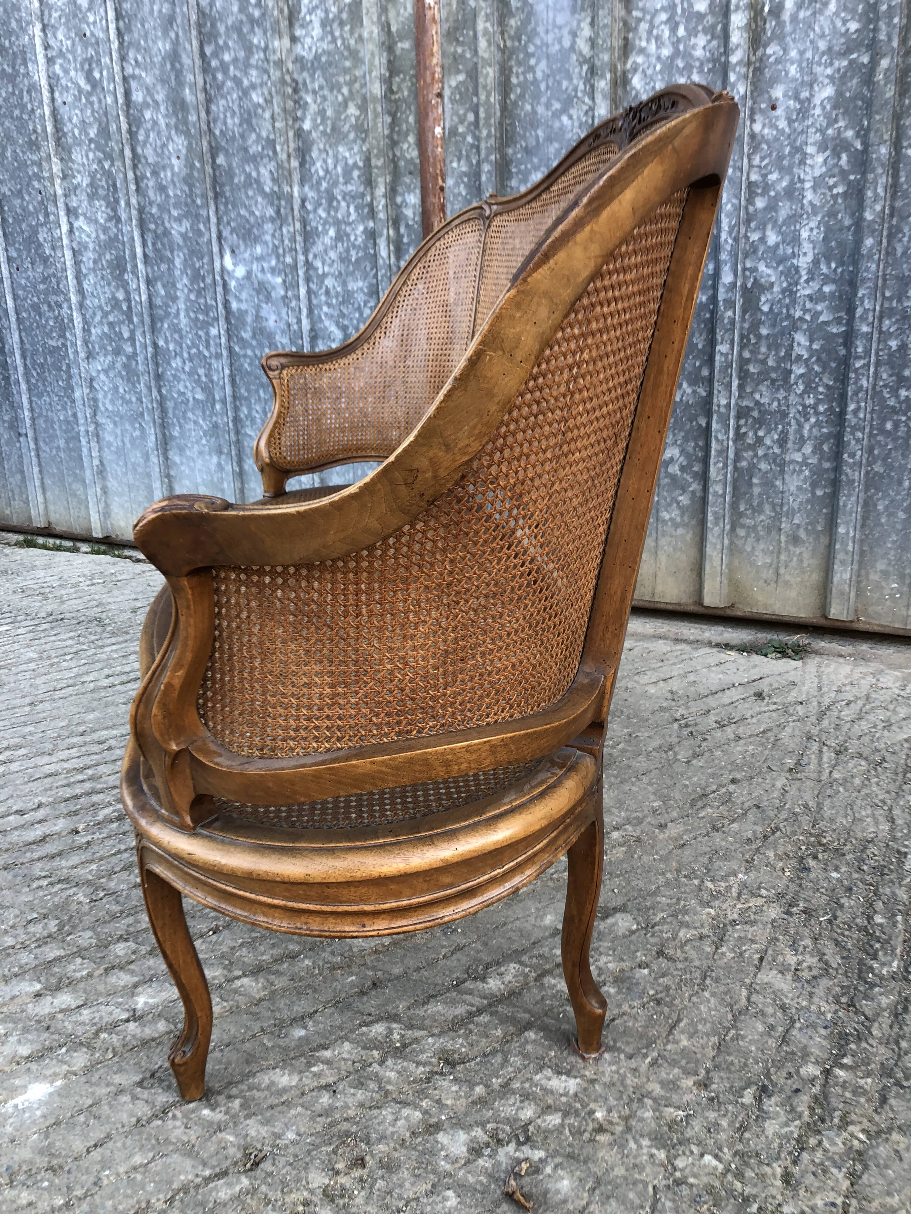Antique Louis XV bench in solid walnut and caning