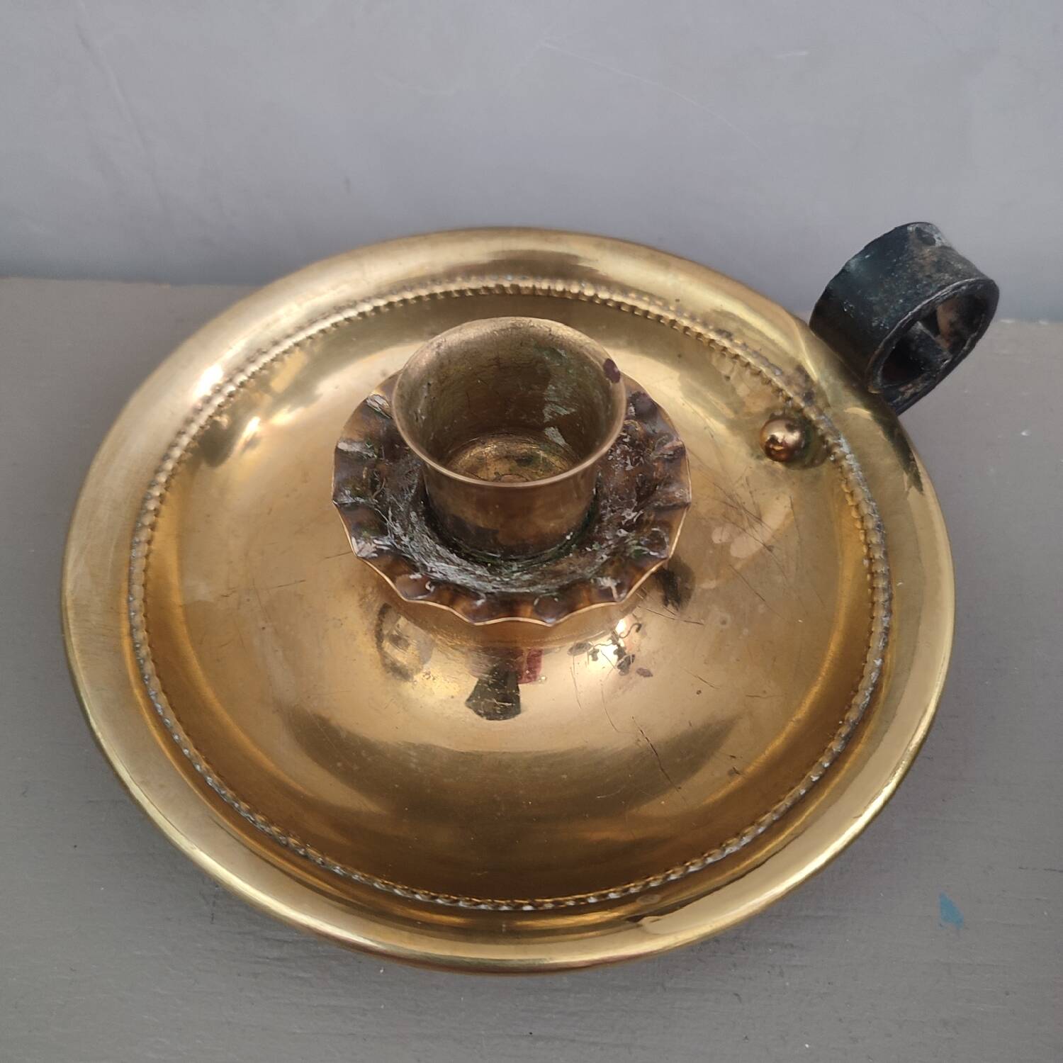 Brass cellar candle holder