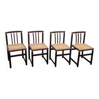 4 dark wood and cane chairs