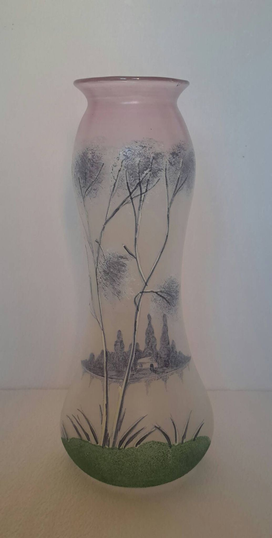 Frosted glass vase enhanced by hand