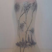 Frosted glass vase enhanced by hand