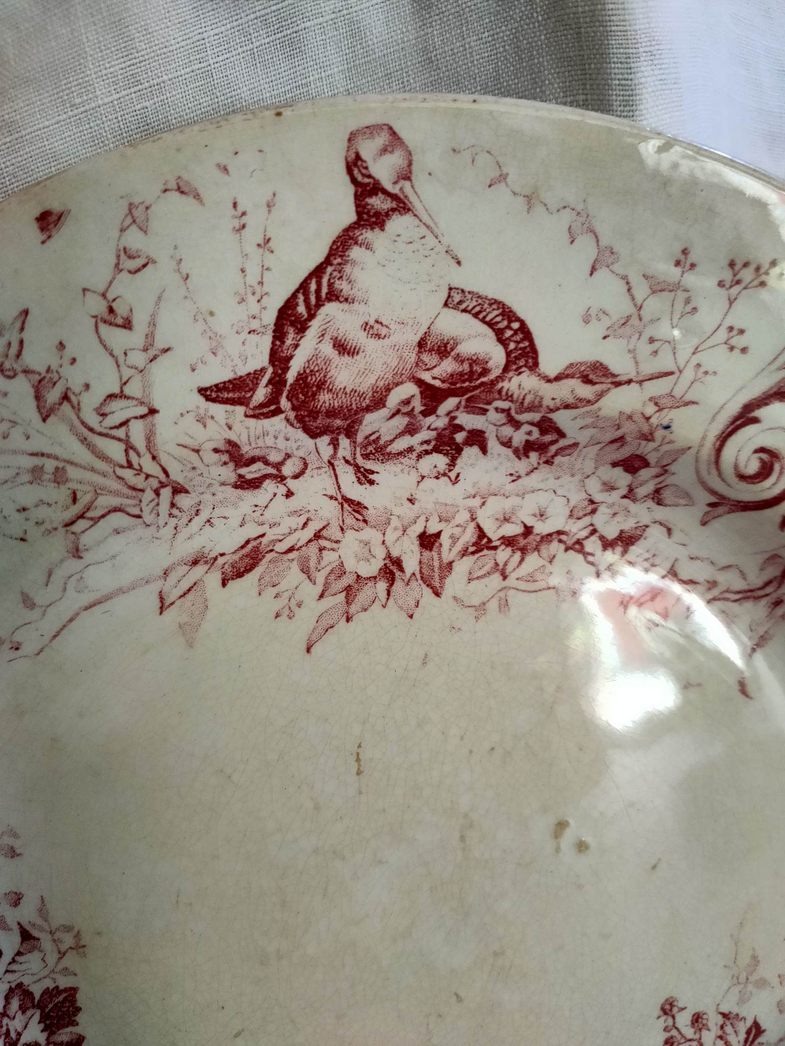 Assiette plate terre de fer faïence de Lunéville K/G