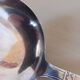 Silver-plated metal ladle, art deco motif.