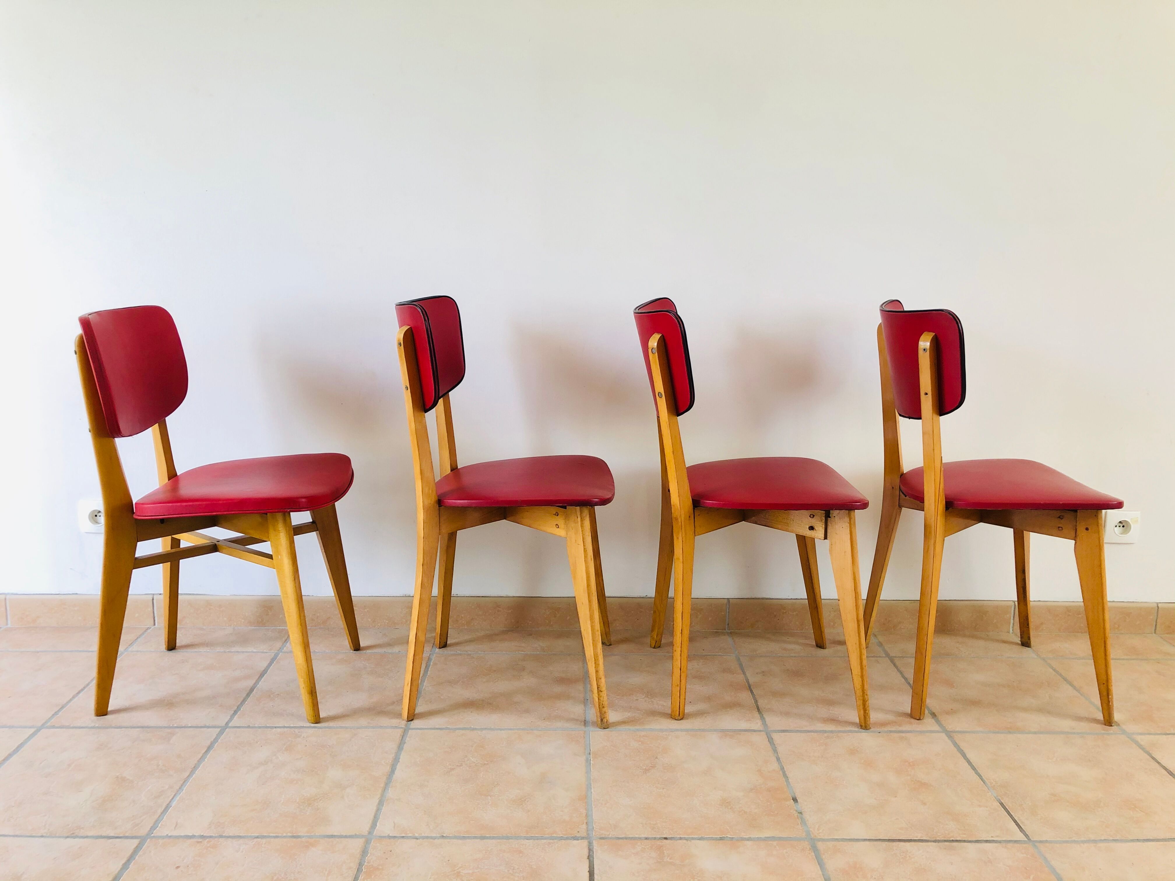 Set of 4 vintage chairs in oak and skai 1970