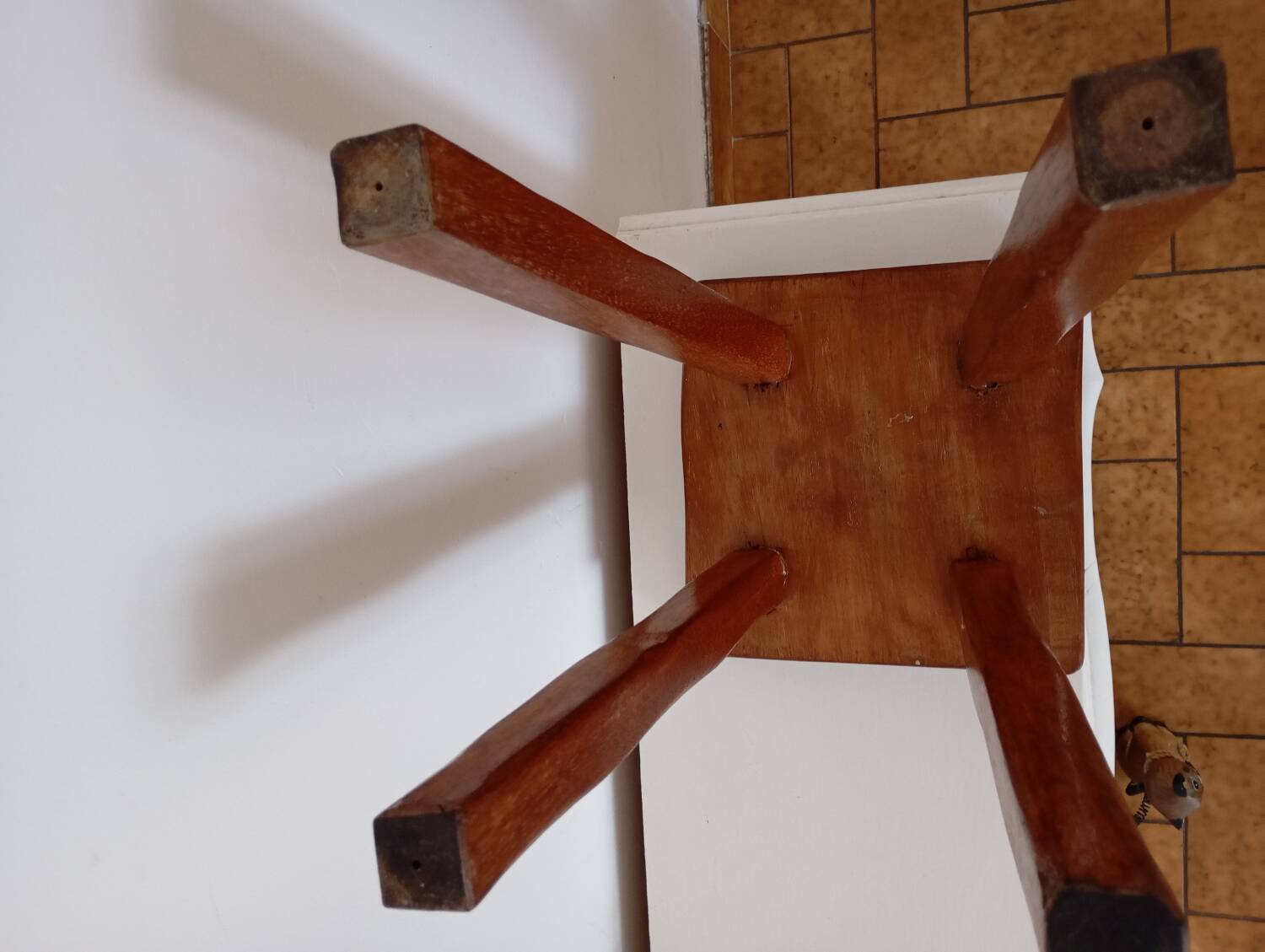 Brutalist style wooden stool
