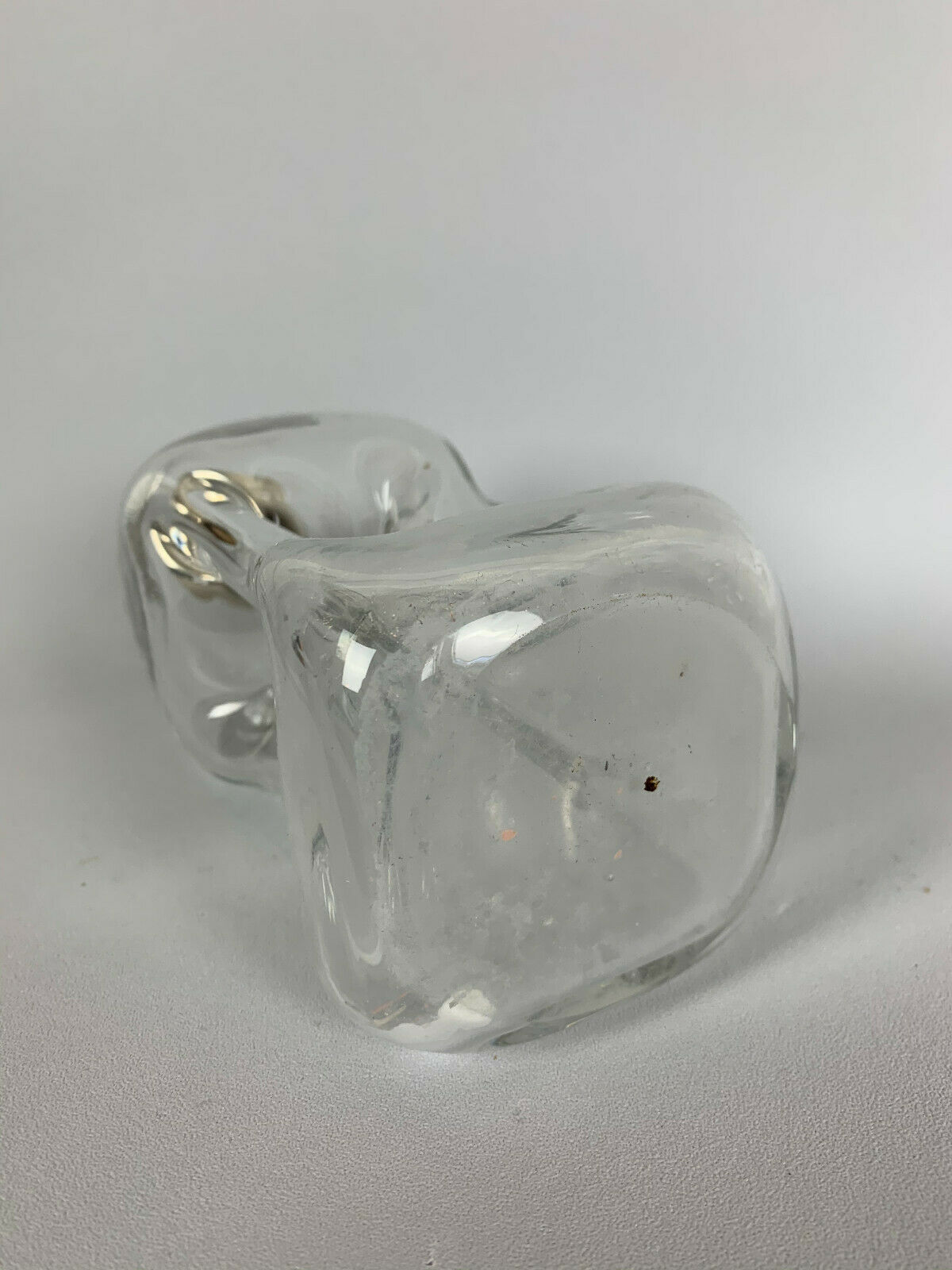 Blown glass carafe with silver frame and cap
