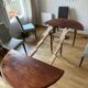 Walnut table with 6 legs and 2 extensions.