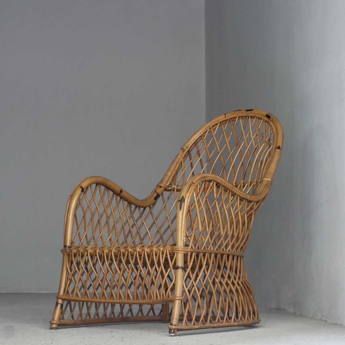 Fauteuil en rotin Gervasoni, années 1960