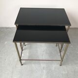 Pull-out tables in glass and brass