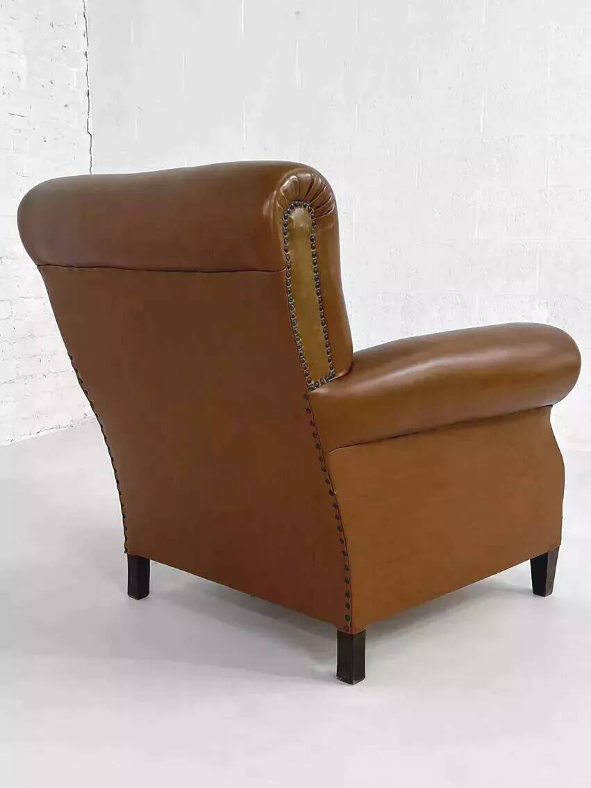 50s club chair in imitation leather and wood