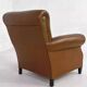50s club chair in imitation leather and wood