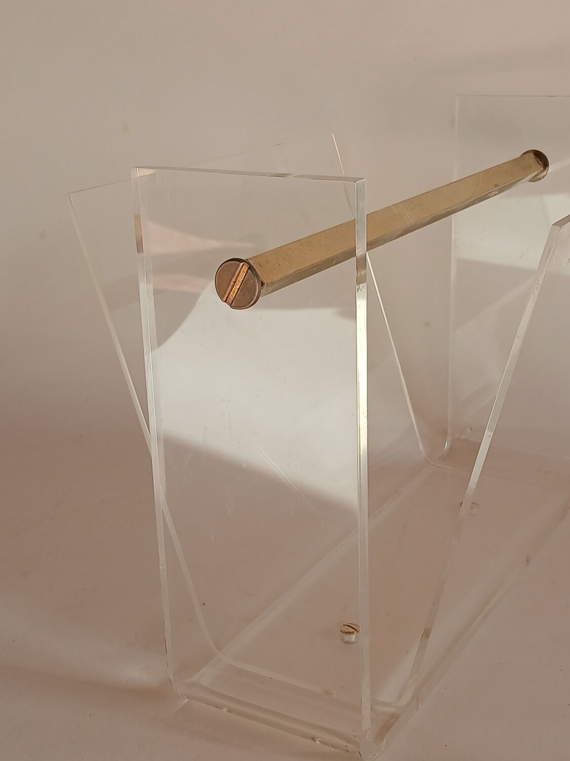 Acrylic magazine rack by David Lange