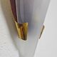 Pair of brass wall lights in Mid Century Modern style attributed to Stilnovo.