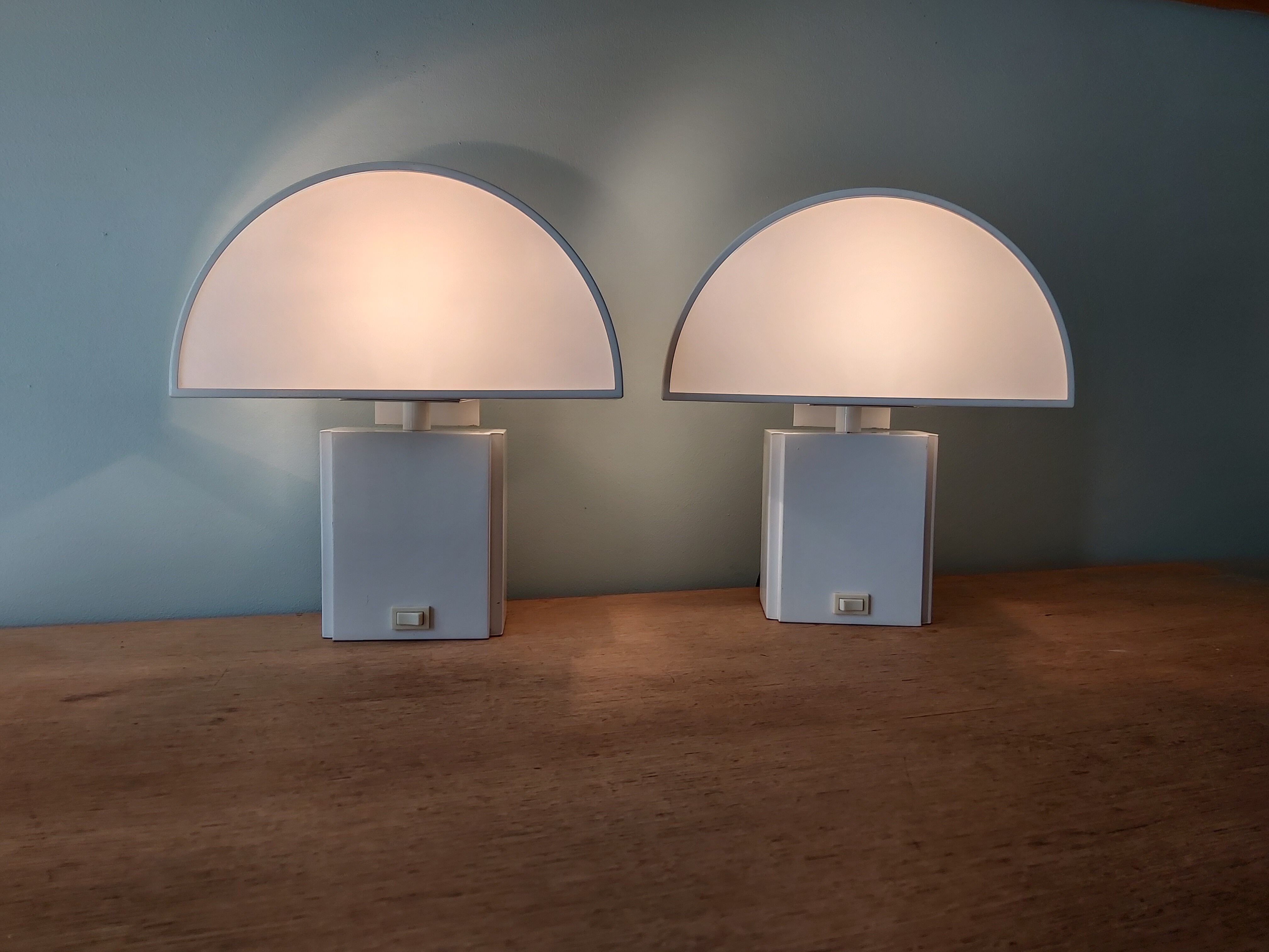 Pair of wall lamps, Olympus model, Harvey Guzzini, 70s