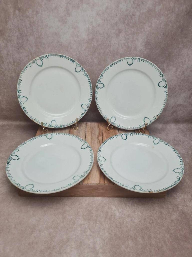 Set of 4 antique plates, Terre de fer Saint-Amand, green decoration.