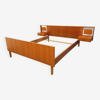 Vintage Scandinavian style double bed in teak from the 60s with integrated bedside lights