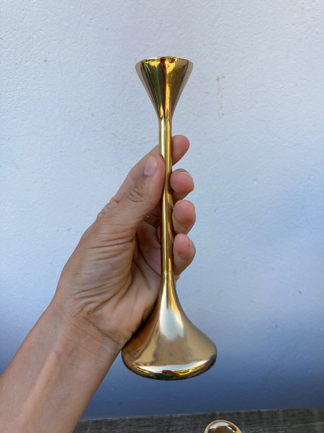 Duo of Scandinavian candle holders in gilded brass