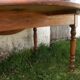 Round drop-leaf table in beech and pine