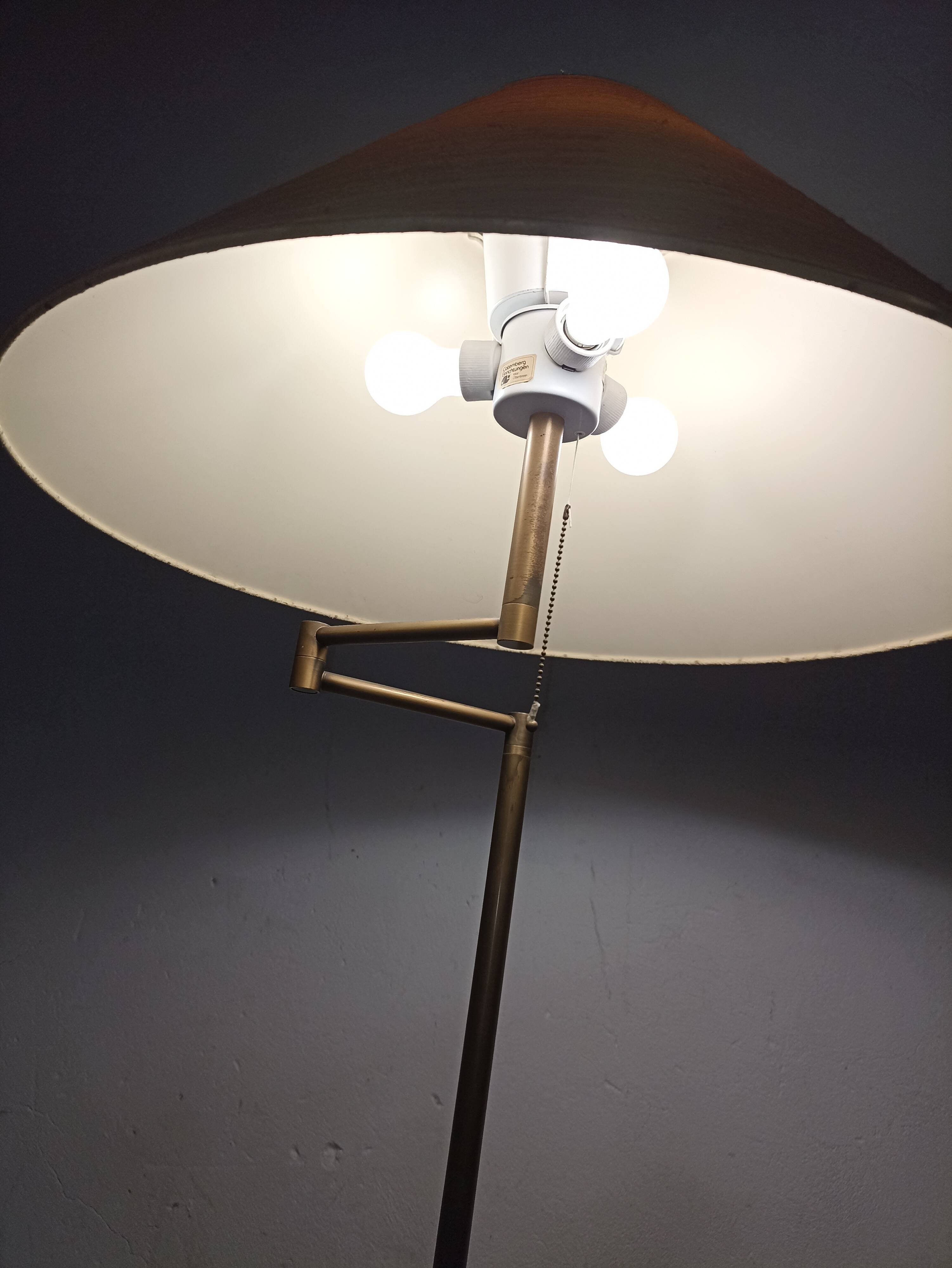 Brass articulated floor lamp