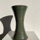 Dark green handcrafted vase with glazed ceramic grass blades