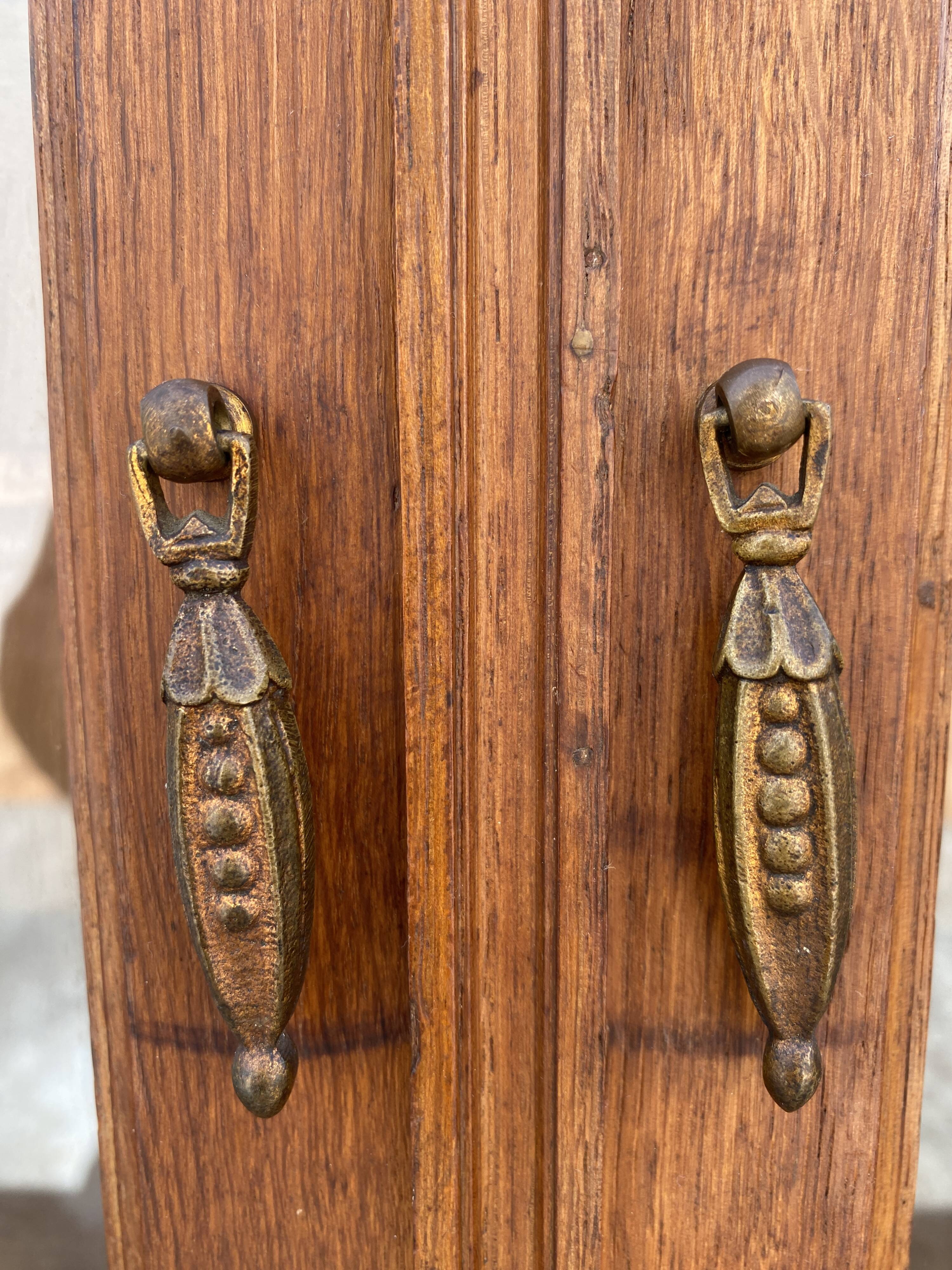 Old small glass display cabinet from the early 20th century.