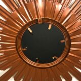 Sun mirror "André" in gilded sheet metal witch eye