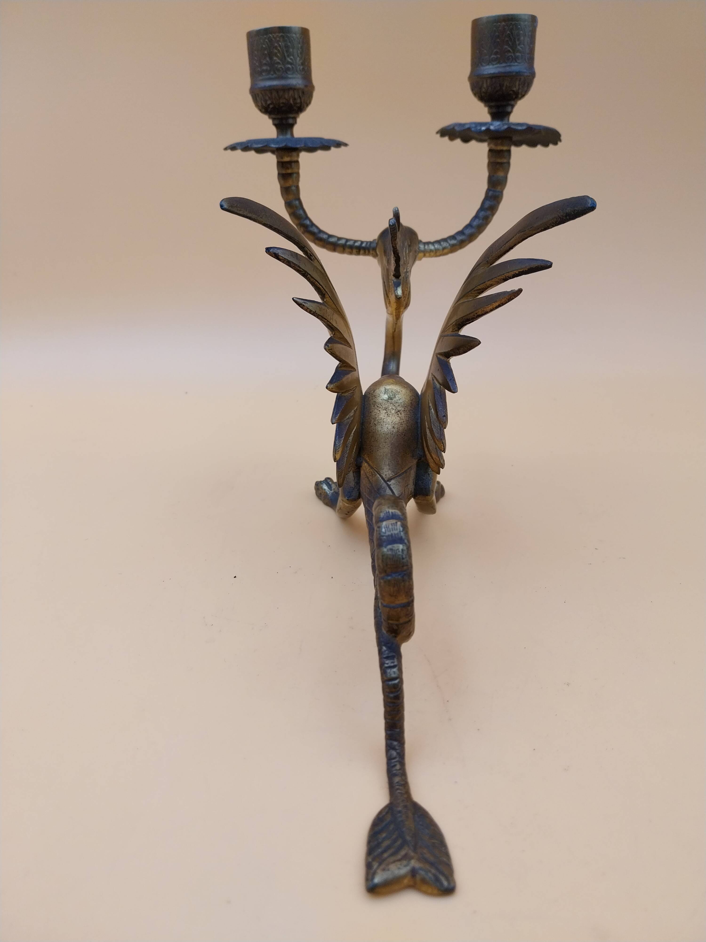 Pair of bronze candlesticks with chimera dragons