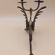 Pair of bronze candlesticks with chimera dragons